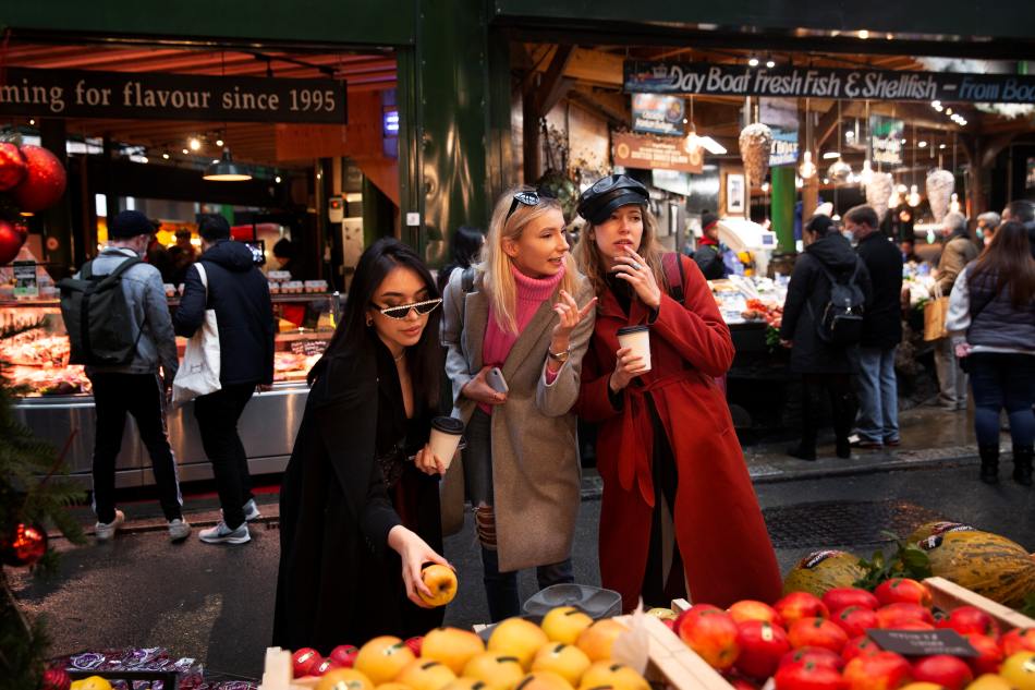 Melbourne market girls looking at the stalls